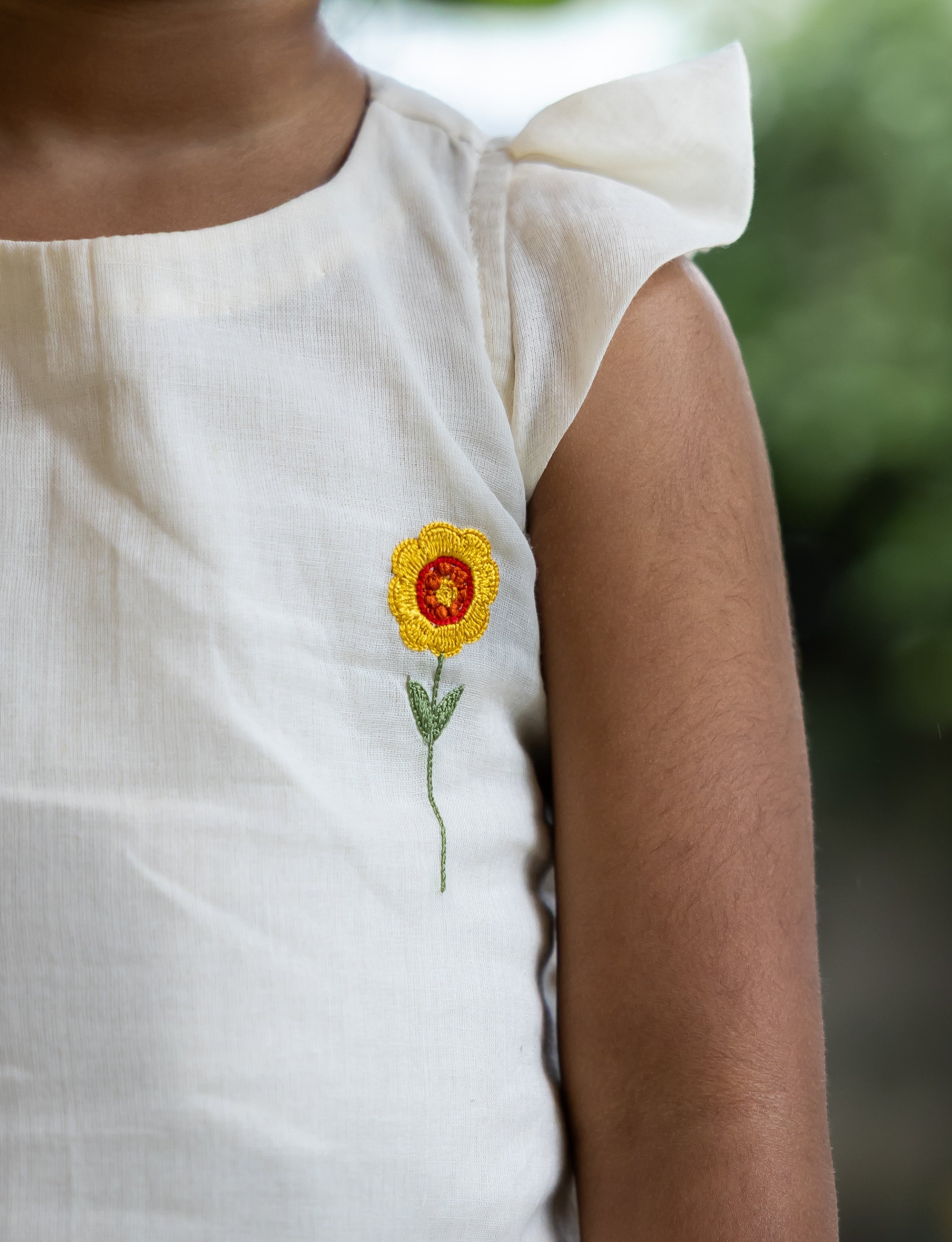 Flower Embroidered Off White Kurta with Flared Bottom