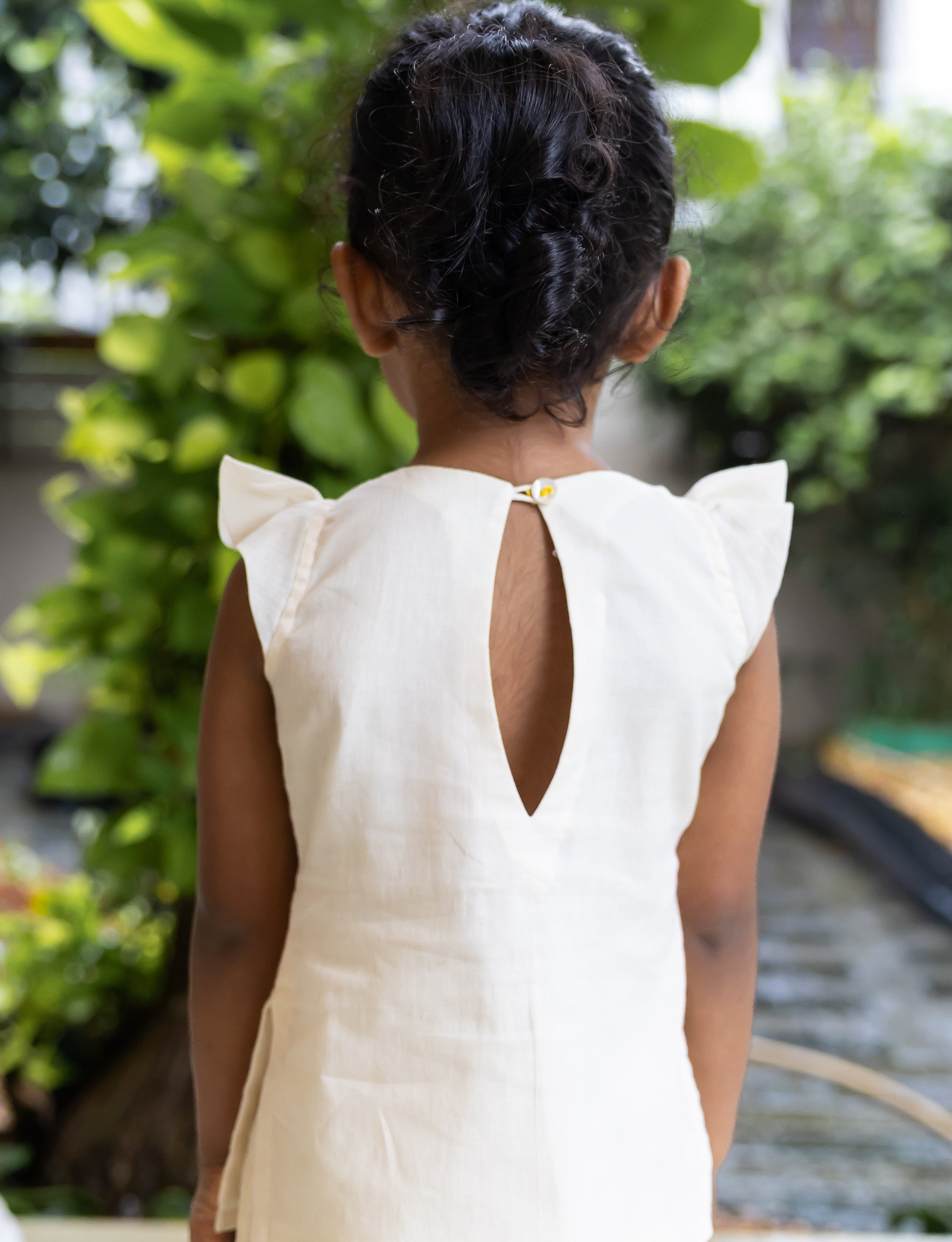 Flower Embroidered Off White Kurta with Flared Bottom