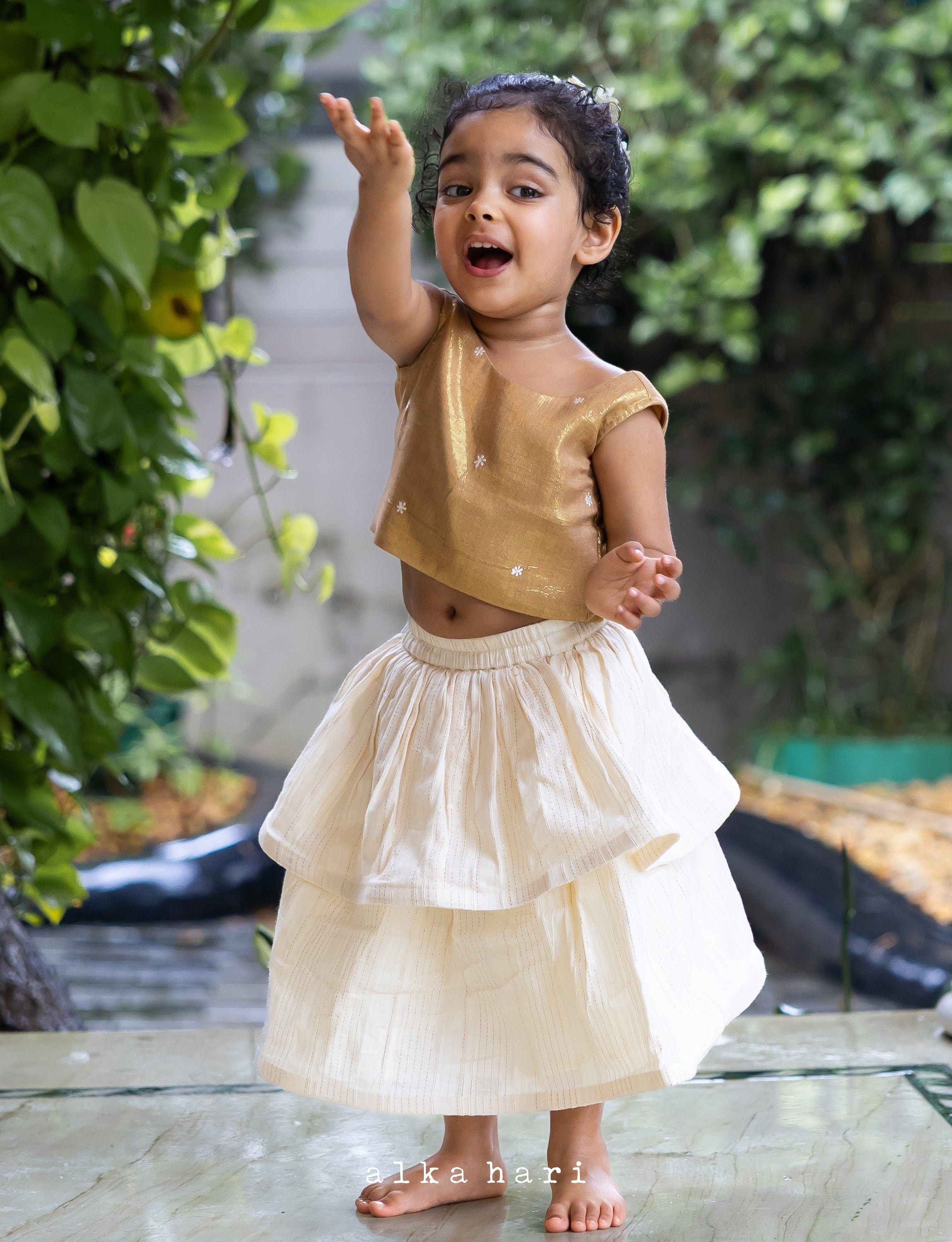 Golden Back-Tie Crop Top with Layered Skirt