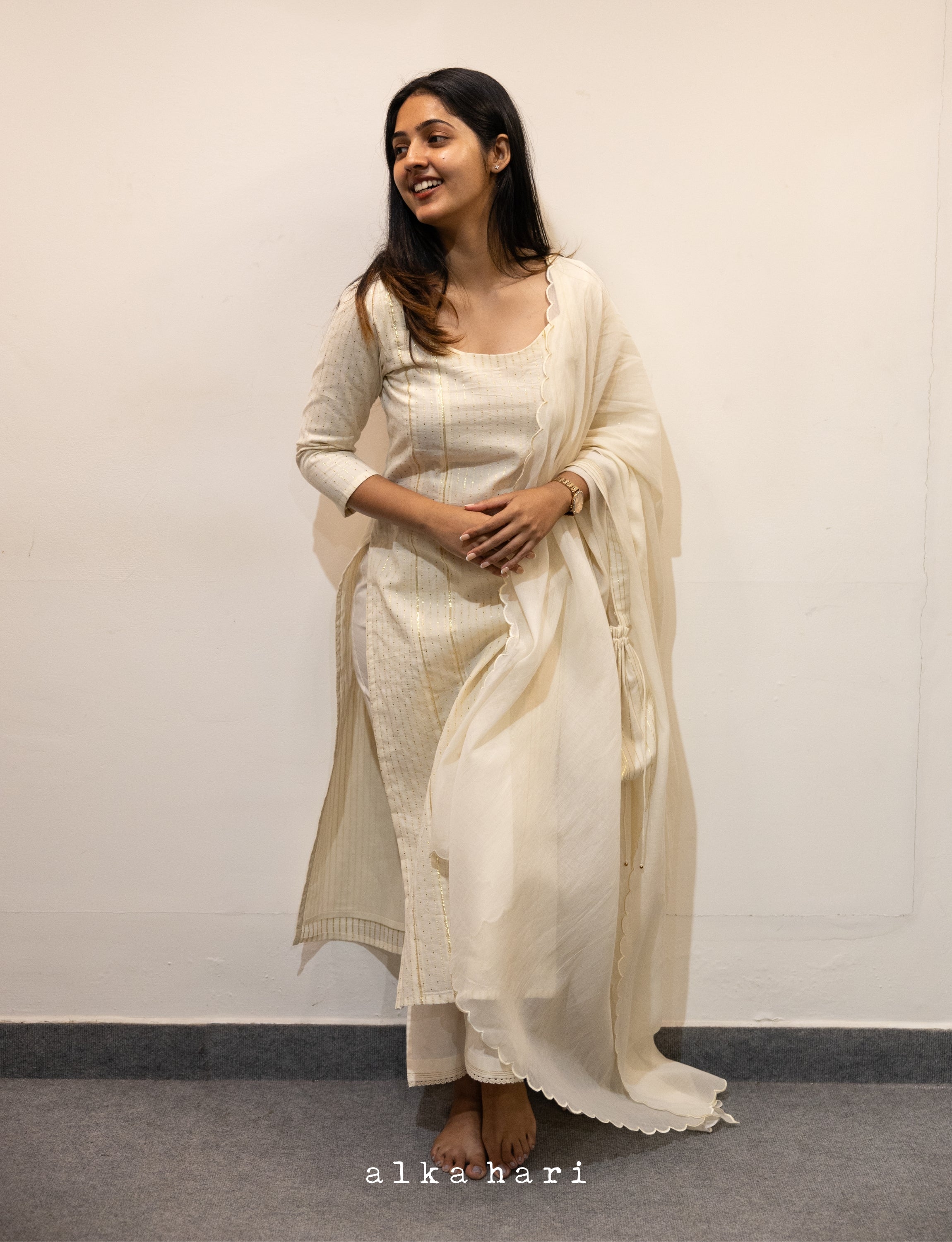 Off White Kurta with Gold Zari Butta and Stitch Lines