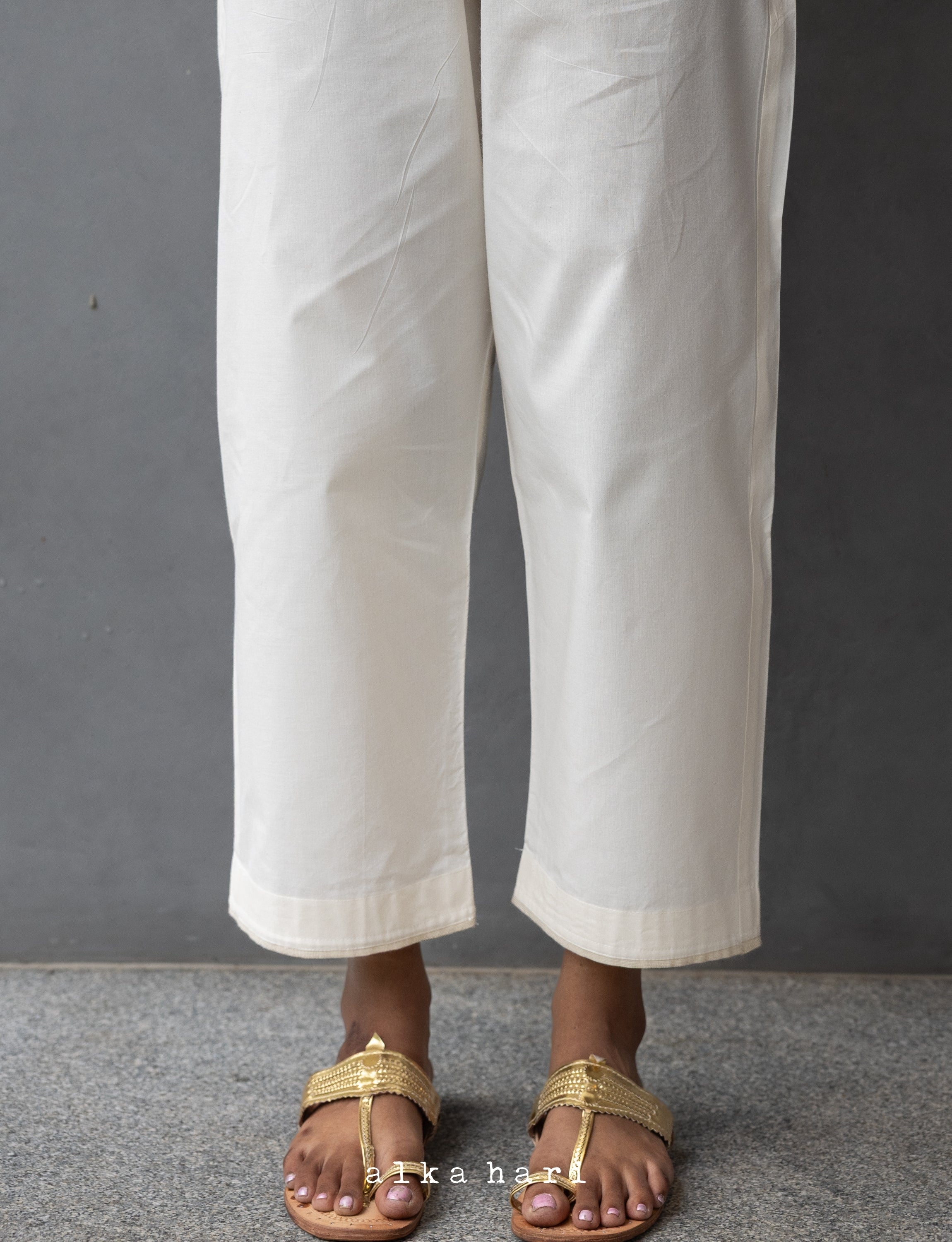 Off White Straight Pants with Golden Border