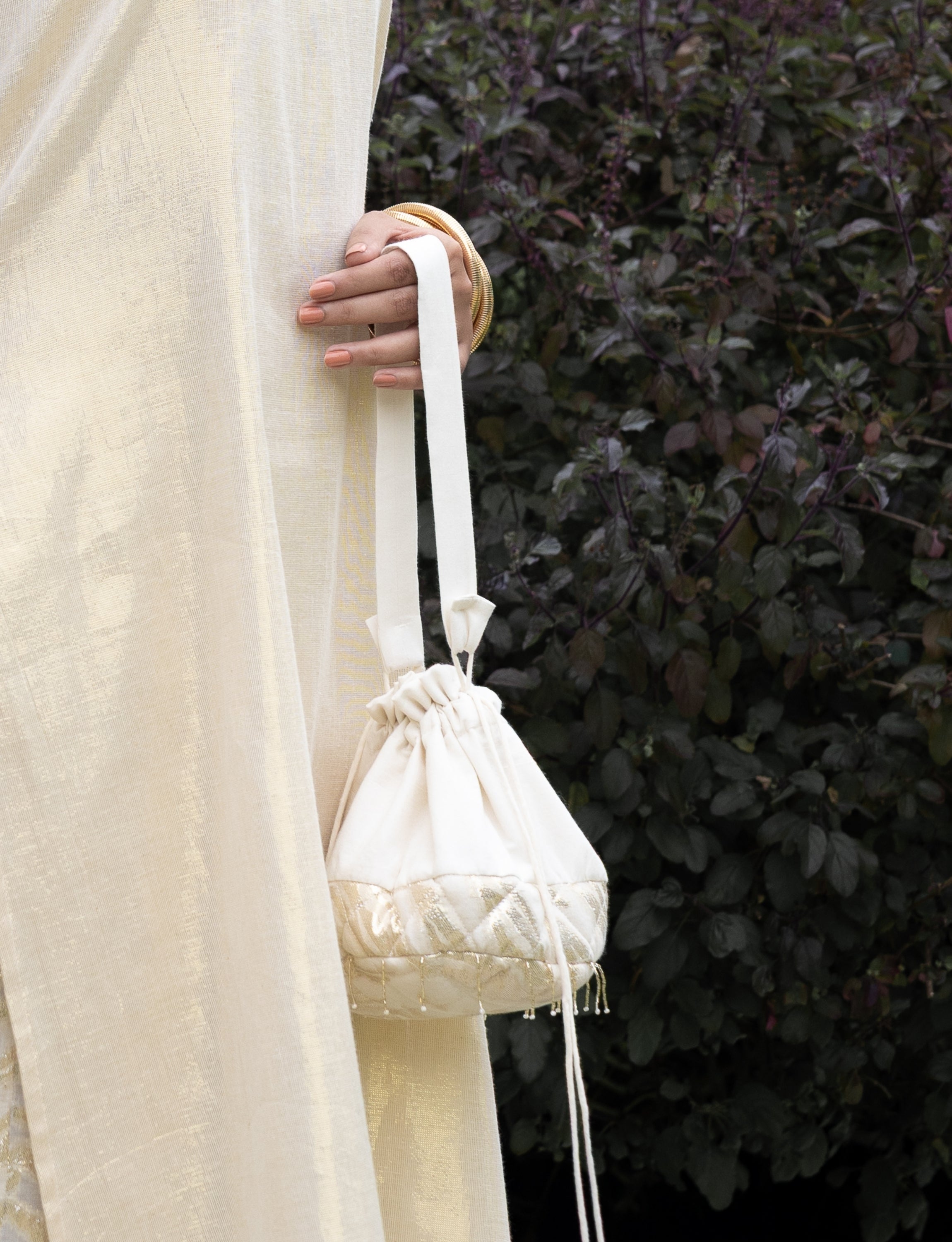 Off-White Potli with Quilted Base and Gold Detailing