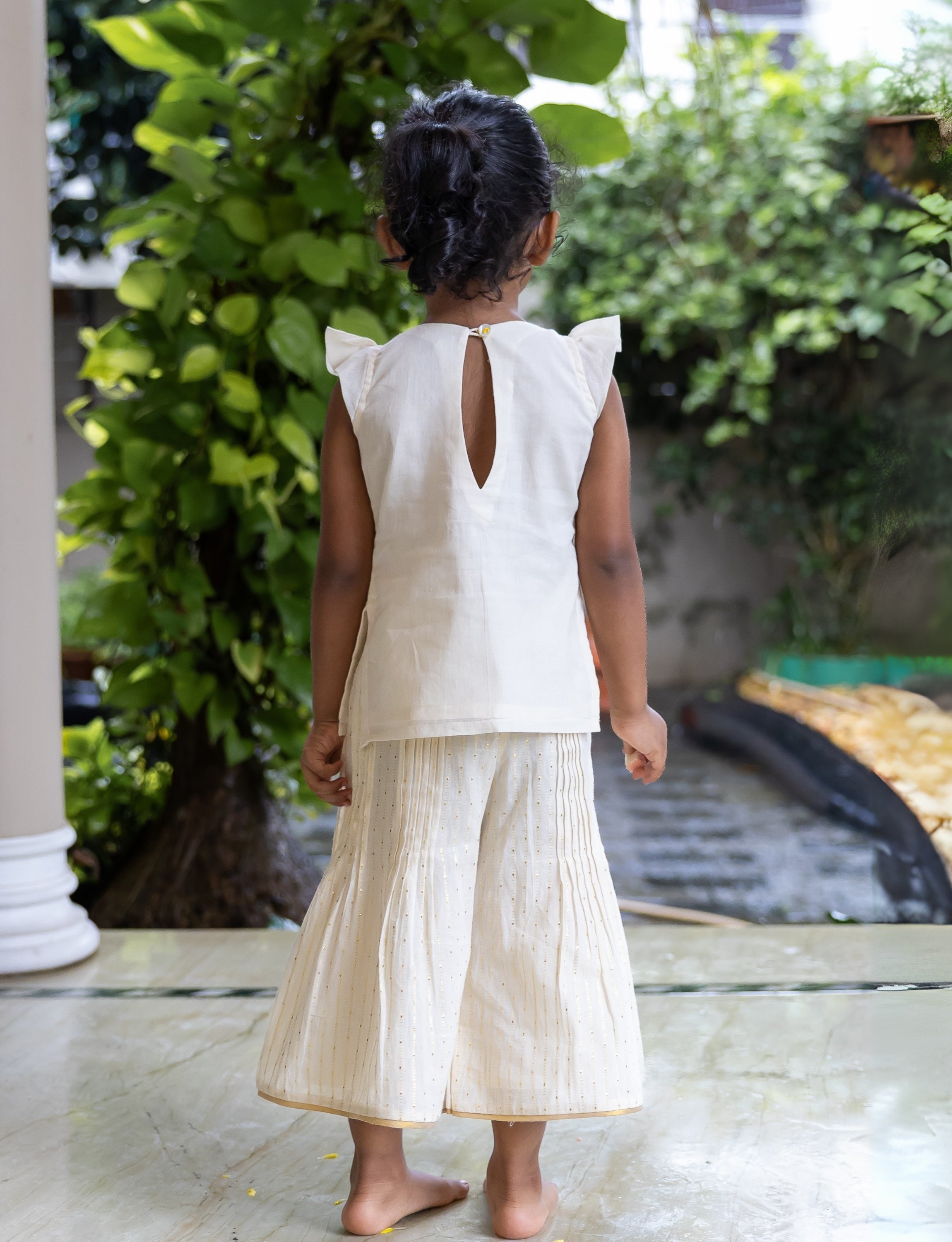 Flower Embroidered Off White Kurta with Flared Bottom